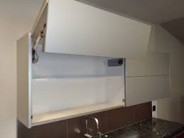The center of the part installed on the door was set back 98mm (from the hinge edge) the cabinet piece is set back 32mm from closed door point. Roll Up Doors Kitchen Ideas Photos Houzz