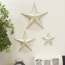 Litton Lane Metal Cream Star Wall Decor