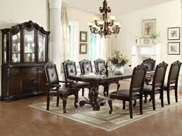 Formal dining room sets are available in many designs. The Kiera Collection By Crown Mark Carries An Elegant Traditional Style That Will Bring A Time Formal Dining Room Sets Leather Dining Room Formal Dining Tables