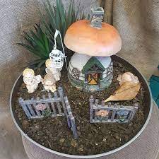Place your party in a garden surrounded by flowers and you're transported to another world. Miniature Fairy Garden South Africa Decor Cherylin Creations
