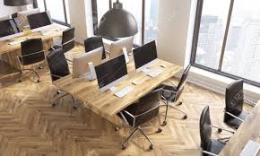 This wooden desk has a simple but stylish appearance and is. Side View Of Coworking Office Interior With Computer Monitors Stock Photo Picture And Royalty Free Image Image 59651162