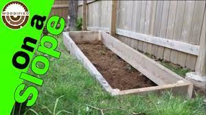 raised garden bed on a slope