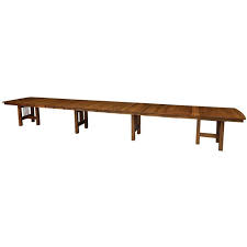 The table can be extended by simply pulling at one end, no additional storage necessary, the table extension is tucked under the table top. The Hartford Extendable Dining Table Seats 12 Up To 20 People Amish Tables