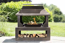 Fire pits are interactive scenery in which special permanent fires can be lit using a combination of salts. Large Steel Firepit With Log Holder Base Savvysurf Co Uk