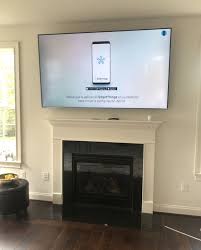 75 Tv Mounted Above Fireplace Tv