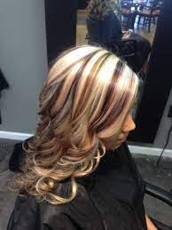 You can have a few strands of your blonde hair colored with a low tone. Blonde Brown And Plum Plum Hair Hair Hair Styles