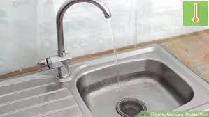 how to clear a clogged kitchen sink pipe