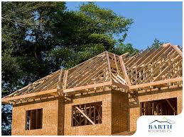 the difference between rafters and trusses