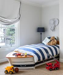 Or, opt for a balanced color scheme with a warm pink or cherry bed surrounded by cool blue or gray hues. Trundle Bed Design Ideas