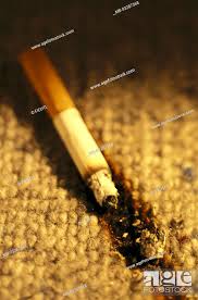 carpet detail cigarette burn still