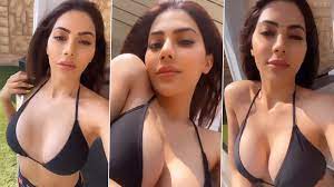 Nikki Tamboli Flaunts Her Boobs As She Gets Sunkissed While Posing in Black  Bikini (Watch Video) | 📺 LatestLY