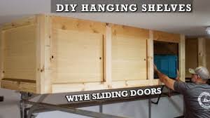 A storage rack made of wood might do. Diy Hanging Storage Shelves With Sliding Doors Overhead Garage Storage 13 Steps With Pictures Instructables