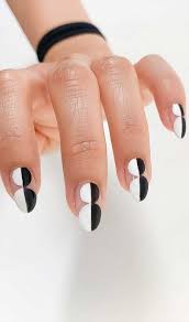 The bows and crystals make this nail design a best choice for those sweet girls. 57 Pretty Nail Ideas The Nail Art Everyone S Loving Black And White Nails