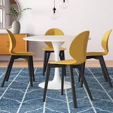A plush mustard yellow seat rests atop of slim steel legs. Amira Dining Chair Reviews Allmodern