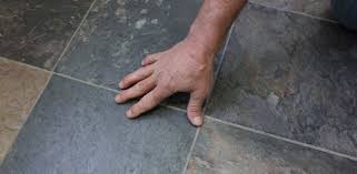 installing tile over vinyl flooring on