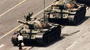 The image shows an unidentified chinese man standing up. Famed Tank Man Photo Vanishes From Bing Search Engine