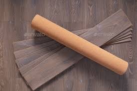 cork roll and laminate floor wood