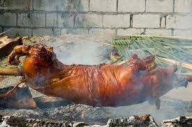how to cook a pig in the ground
