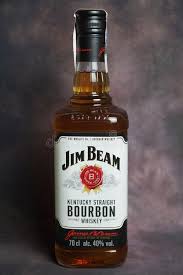 jim beam whiskey bottle on dark vintage