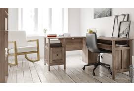 Place this office by kathy ireland® echo l shaped desk in a corner to save space in compact areas or make use of the fully finished back to take a prominent position in the middle of the room. Ashley Furniture Signature Design Arlenbry H275 34 34r Contemporary L Shape Home Office Desk Del Sol Furniture L Shape Desks