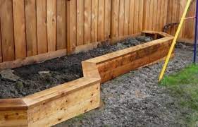 Raised Garden Bed Against A Fence
