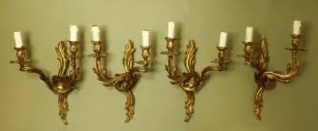 Set Of Four Two Branch Wall Sconces