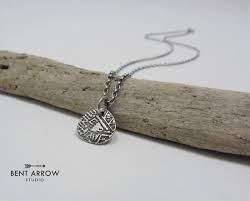 ancient coin necklace from bent arrow