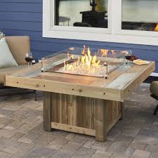 A gas fire pit table is an outdoor patio table that provides heat through a burner and adjustable flame. Vintage 48 Inch Square Gas Fire Pit Table With Crystal Fire Burner Marx Fireplaces Lighting