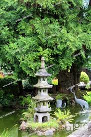 Japanese Stone Lantern And Bird Statues