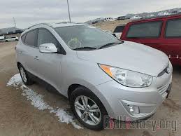Report KM8JUCAC9DU628913 HYUNDAI TUCSON 2013 SILVER GAS - price and damage history