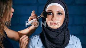 muslim woman in hijab in beauty salon