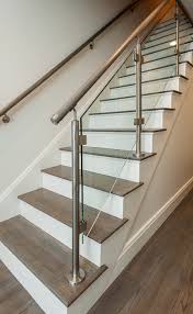 15 Distinctive Glass Staircase Designs