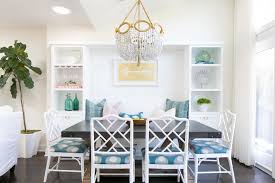 And, in a dining room, you have to take into account several factors like size, shape, color, and material. Coastal Dining Room With Dark Wood Table White Chairs With Patterned Blue Cushions And Bench Seat With Surrounding Shelves Hgtv