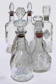 vintage clear glass liquor bottles