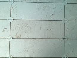 help limestone tile stained by grout