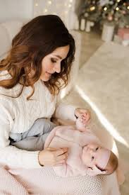 beautiful woman holding baby