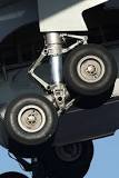 Why are aircraft landing gear tilted?
