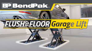 slick bendpak car lift in home garage