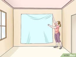 How To Hang Moving Blankets 9 Steps