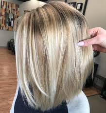 The voluminous side bangs flatter practically all face shapes. 50 No Fail Medium Length Hairstyles For Thin Hair Hair Adviser