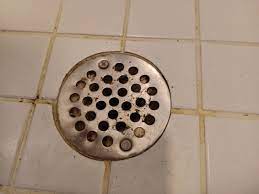 Can I safely remove this drain cover to my shower stall? - Home Improvement  Stack Exchange