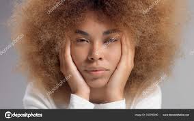 mixed race black woman with big afro