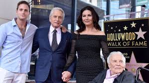 Summertree, starring michael douglas and produced by his father kirk douglas, examines the vietnam war and its consequences on the soldiers drafted to fight and the families they leave behind. Michael Douglas Catherine Zeta Jones And Family Attend Kirk Douglas Funeral Entertainment Tonight