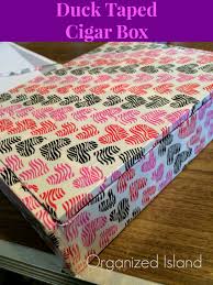 A recycled cigar box and that is where the remotes are now stored! Diy Repurposed Cigar Box Duct Tape Craft Organized Island