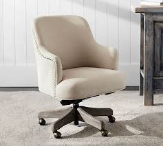 The solid mahogany frame with a deep saddle seat. Reeves Upholstered Swivel Desk Chair Pottery Barn