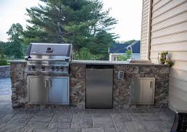 outdoor kitchens are becoming