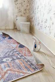 how to uncurl a new rug a beautiful mess