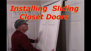 Sliding doors are a stylish, modern way to finish your closet. How To Install Bypass Sliding Closet Doors Youtube