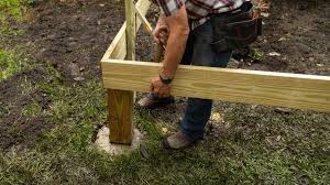 how to attach a wood post to concrete