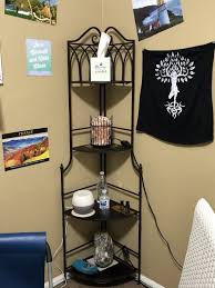 Metal Corner Rack With Brown Decorative